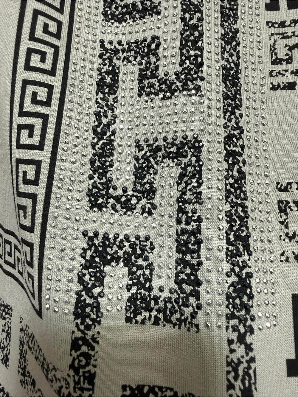 LAVERITA Graphic Pattern Hooded Sweatshirt in Black and Cream. New with tags